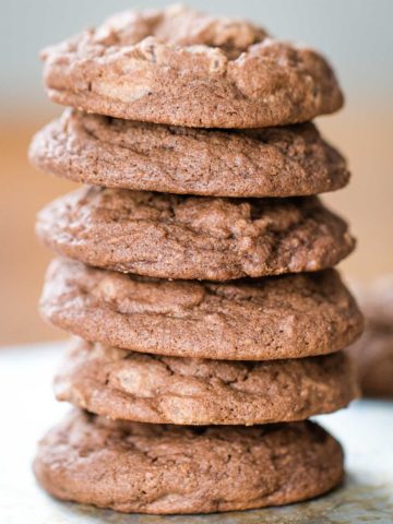 stack of chocolate chocolate chip cookies