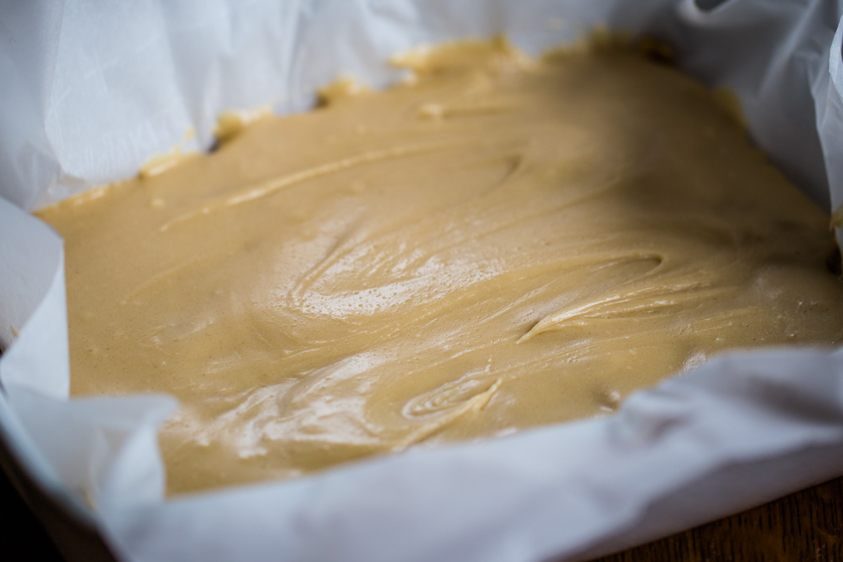 topping on peanut butter bars