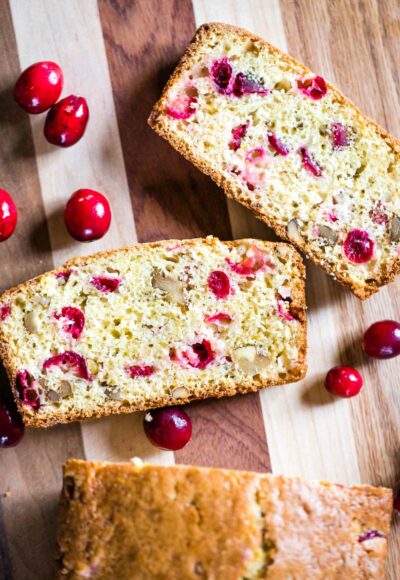 slices of cranberry nut bread on cutting board