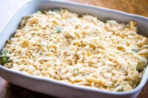 unbaked casserole topped with crumbled crackers