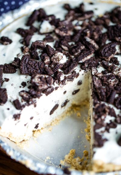 oreo pie with slice taken out of it