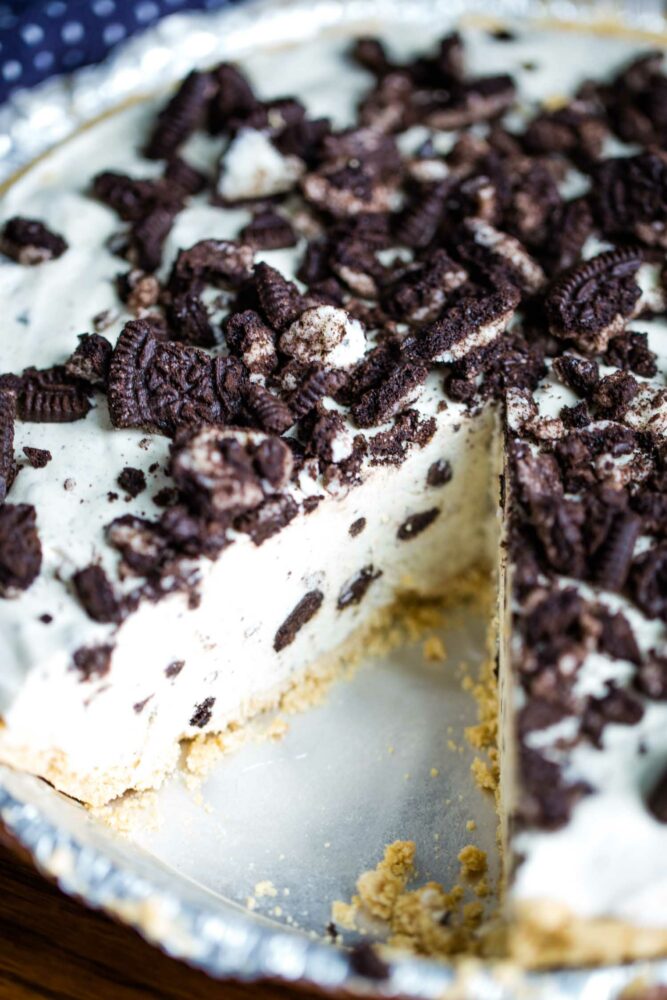 oreo pie with slice taken out of it