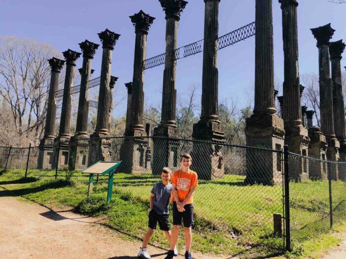 boys in front of Windsor ruins