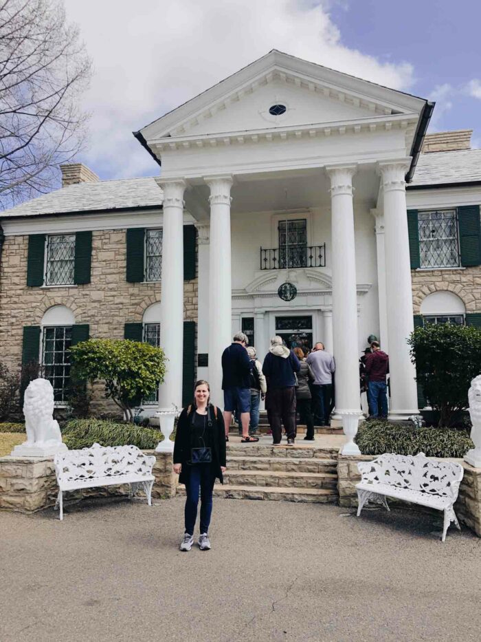 woman in front of Elvis house in Memphis TN