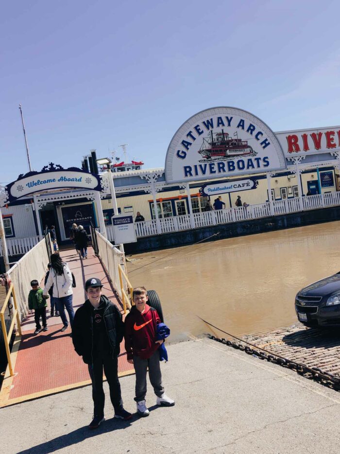 family in front of RiverBoat