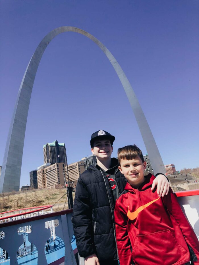boys in front of arch