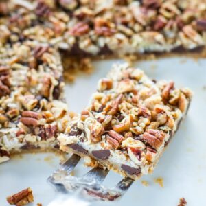 close up of sliced magic cookie bar