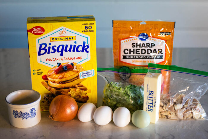 ingredients to make zucchini casserole on kitchen counter