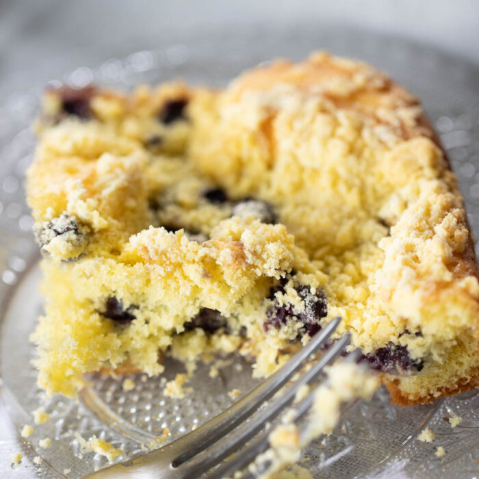 slice of blueberry coffee cake on plate
