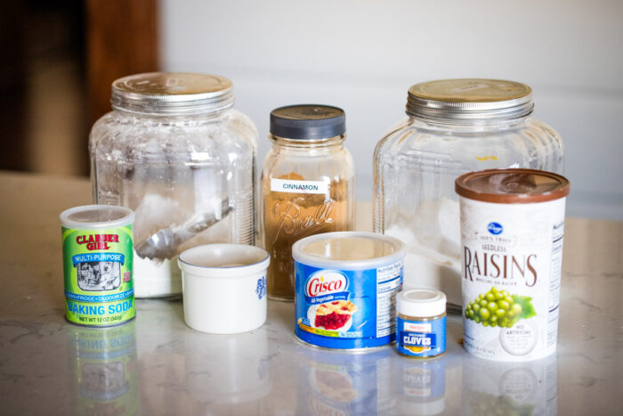 ingredients to make raisin cake on kitchen countertop