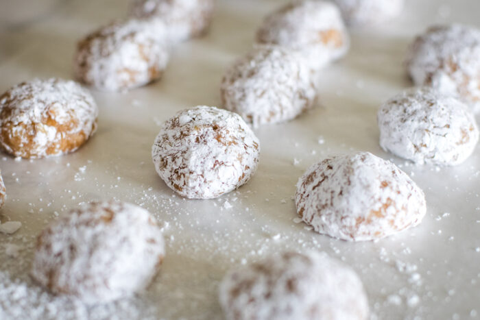 coated rum balls with powdered sugar
