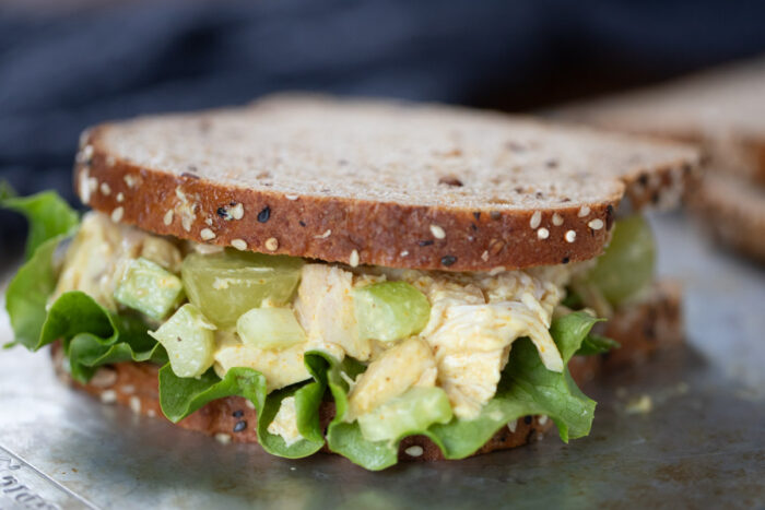 close up of curry chicken salad sandwich