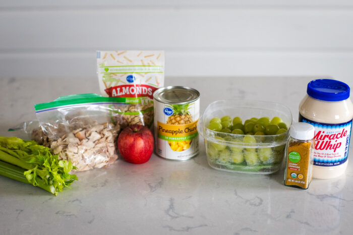 ingredients to make curry chicken salad on kitchen countertop