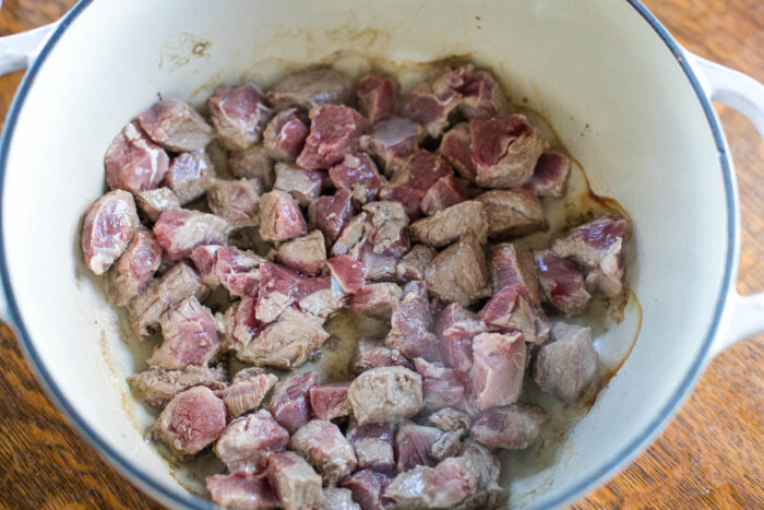 browned stew meat in stockpot