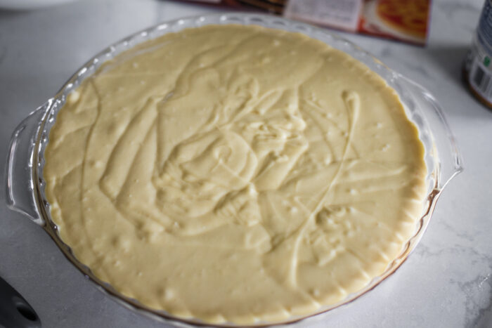 cake batter in pie plate