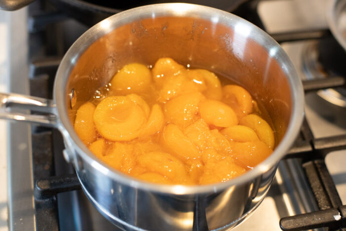 apricots in stockpot for sauce