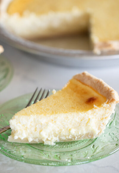 cottage cheese pie piece on plate with fork