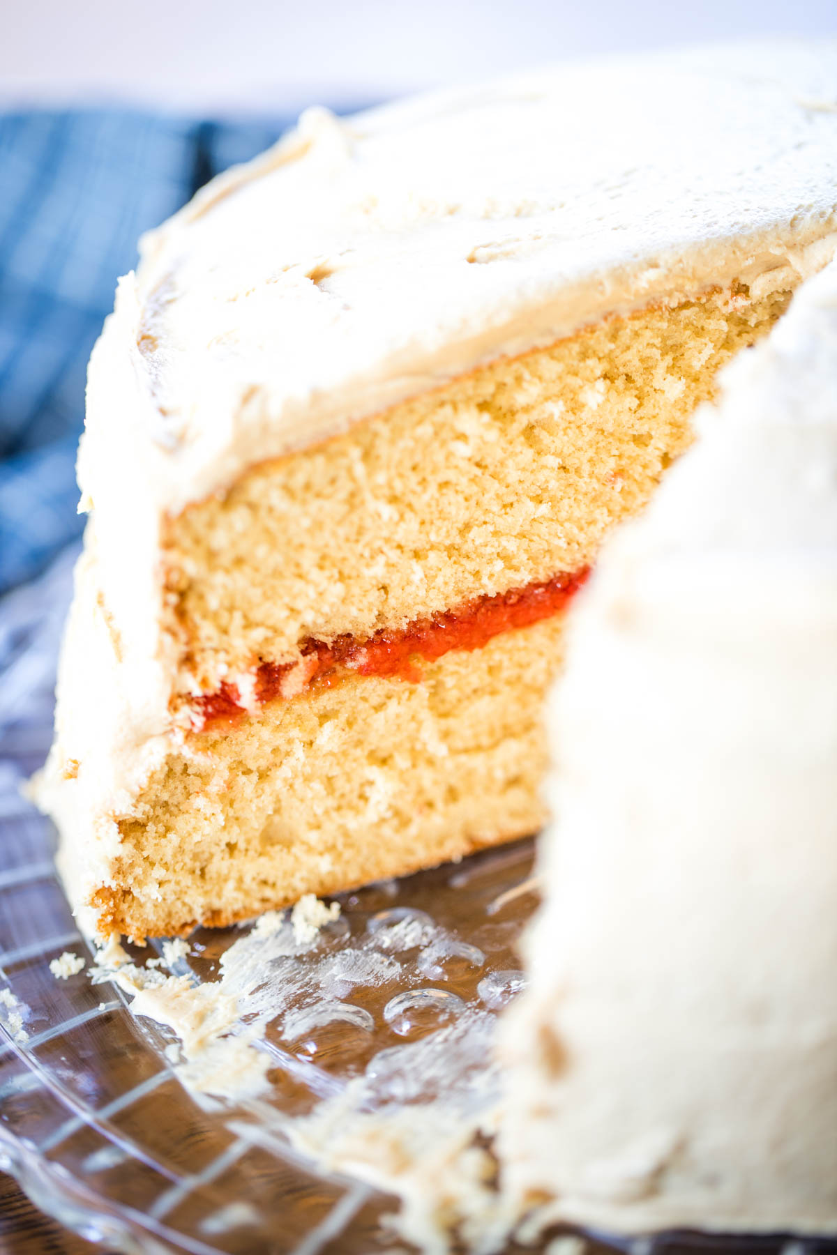 sliced peanut butter and jelly cake on cake plate