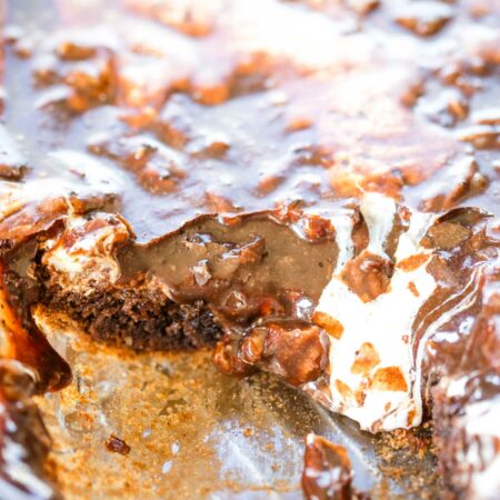 Mississippi mud cake in baking pan with top layer flowing over