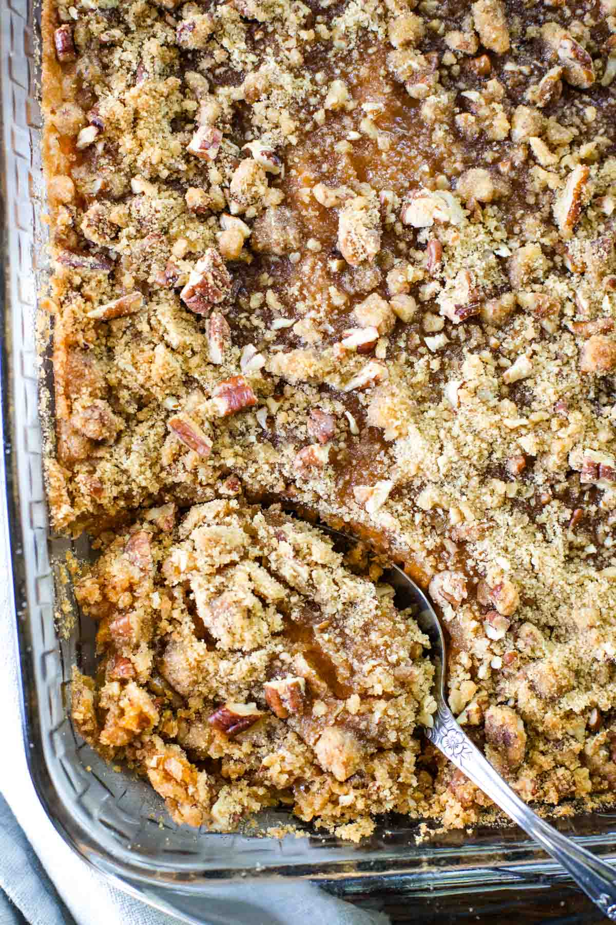 sweet potato casserole with spoon serving
