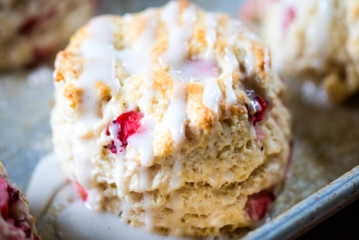 close up of flaky strawberry biscuits