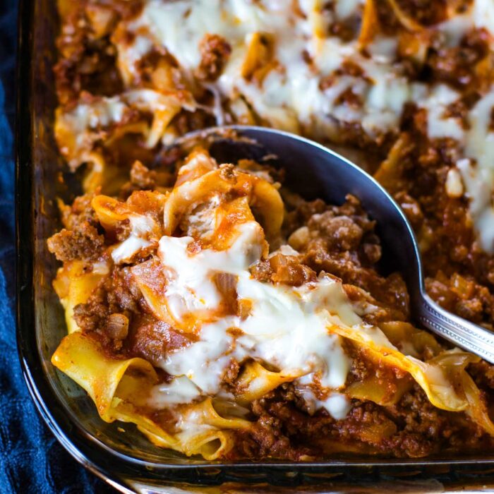 scooped hamburger noodle casserole in baking pan