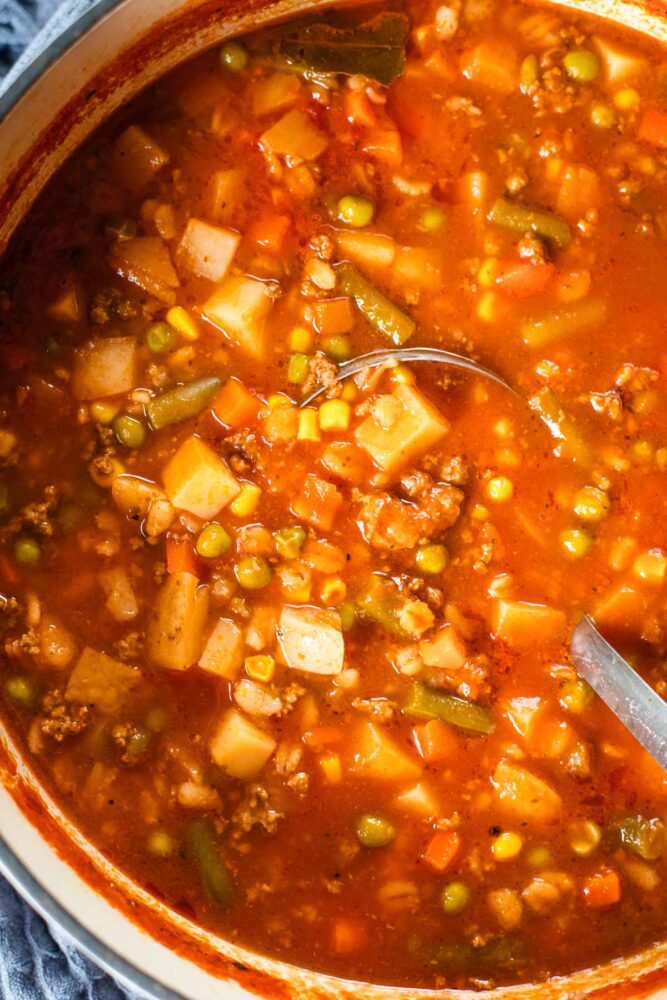 stockpot simmering with vegetable beef soup