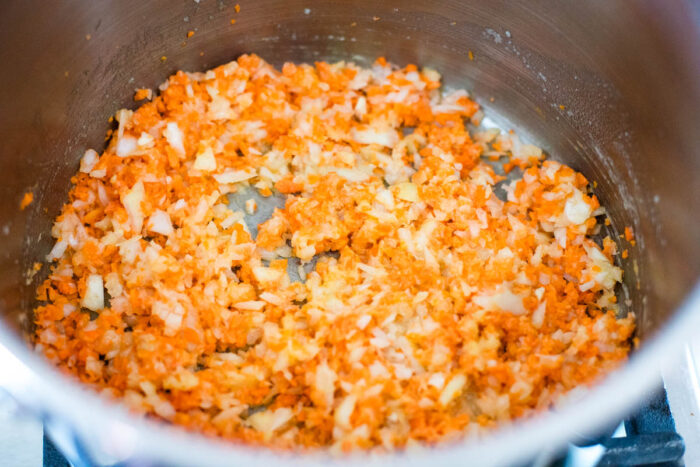 carrots and onions in stockpot