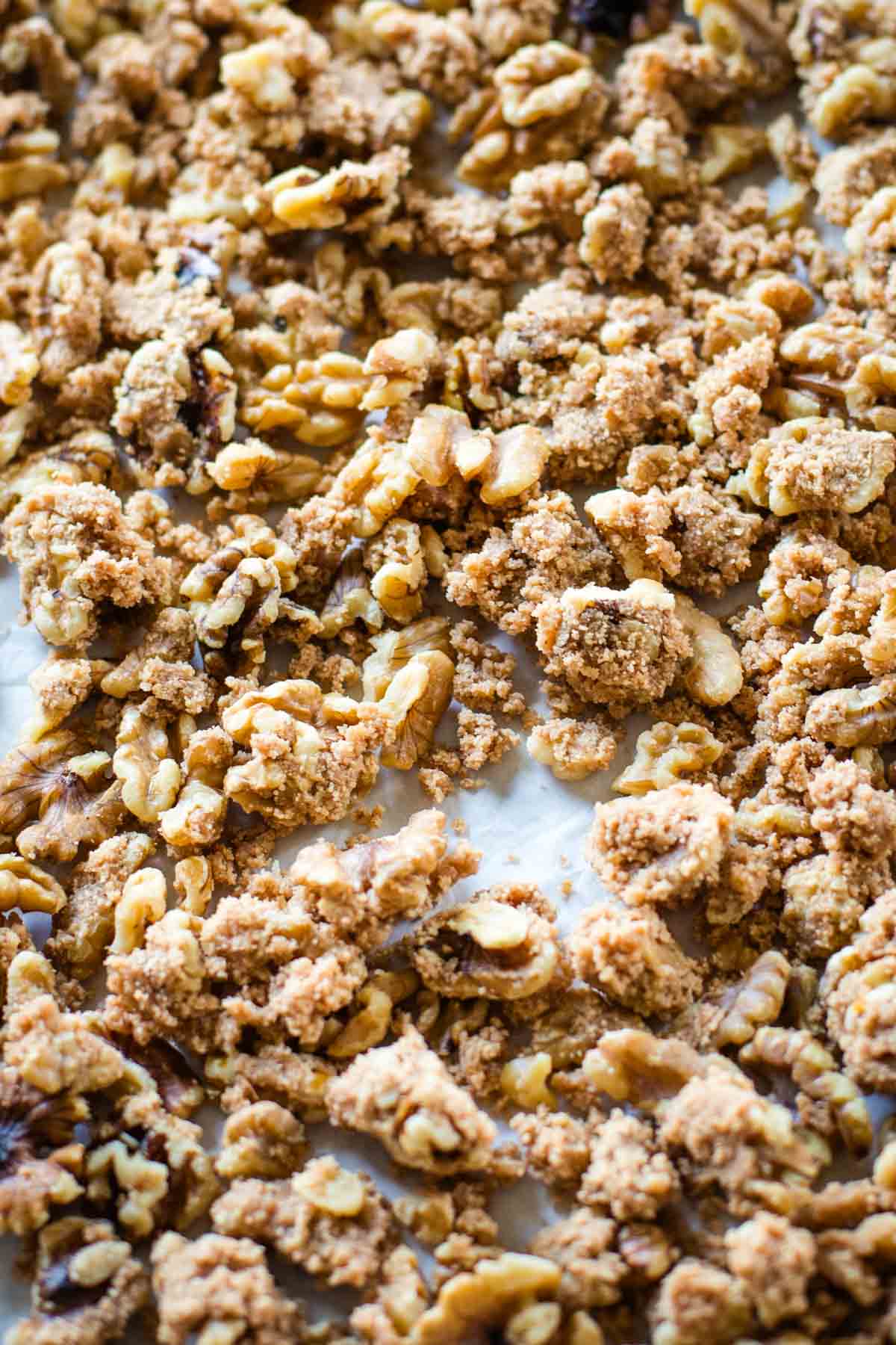 sugared walnuts on parchment paper