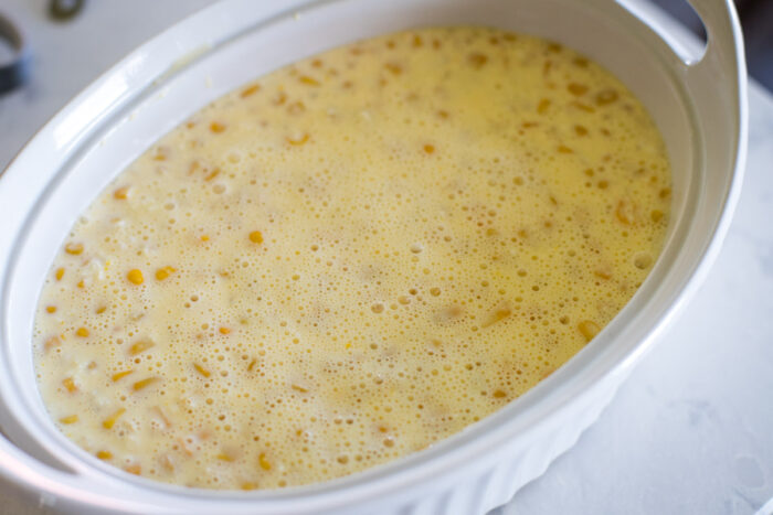 all ingredients mixed in baking dish