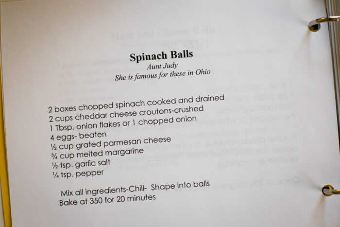 spinach balls recipe in notebook