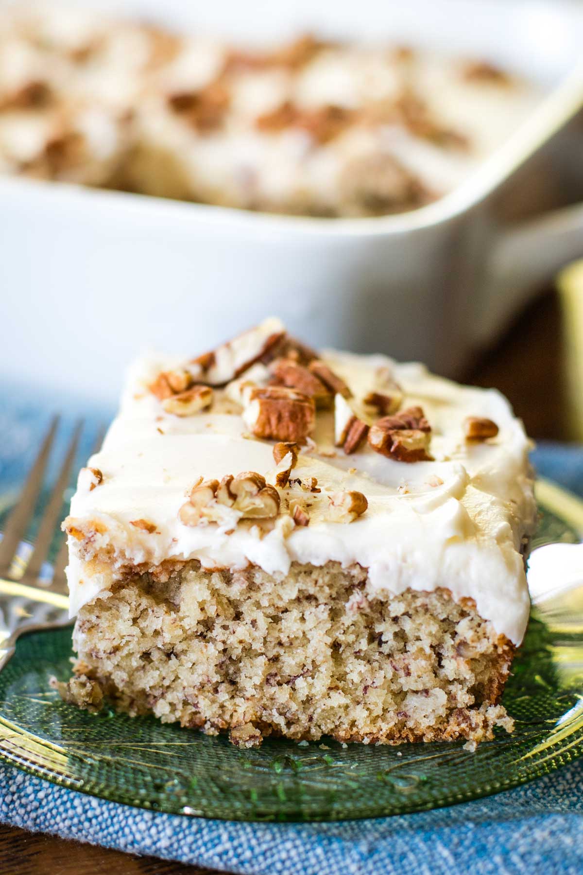banana cake slice on plate with fork