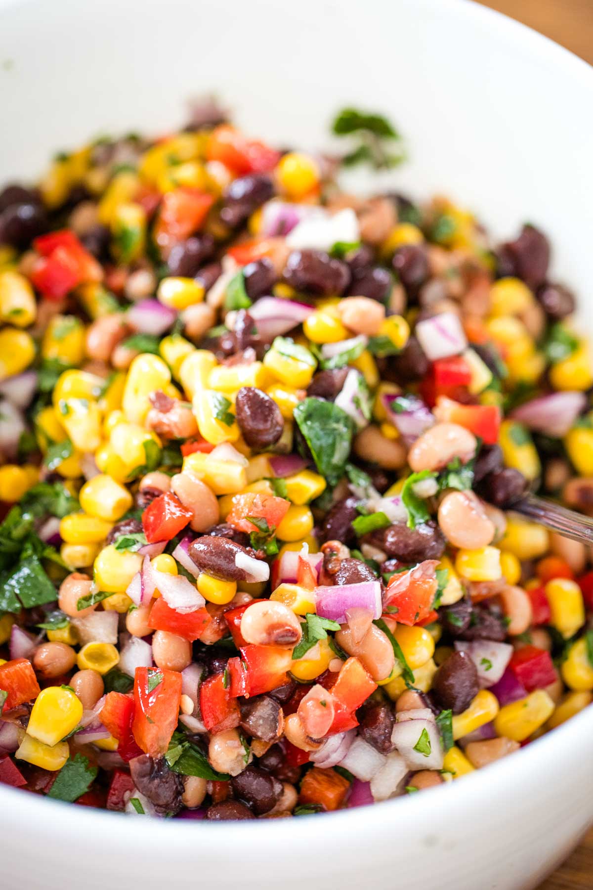 black bean and corn salsa in white bowl