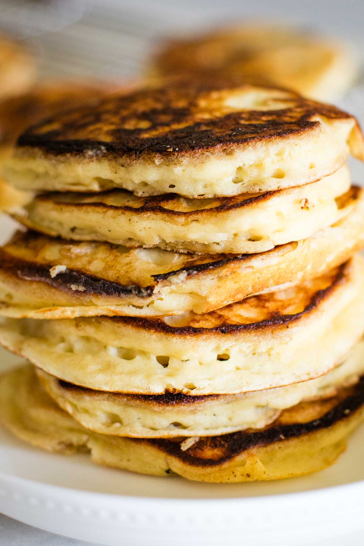 stack of buttermilk pancakes on plate